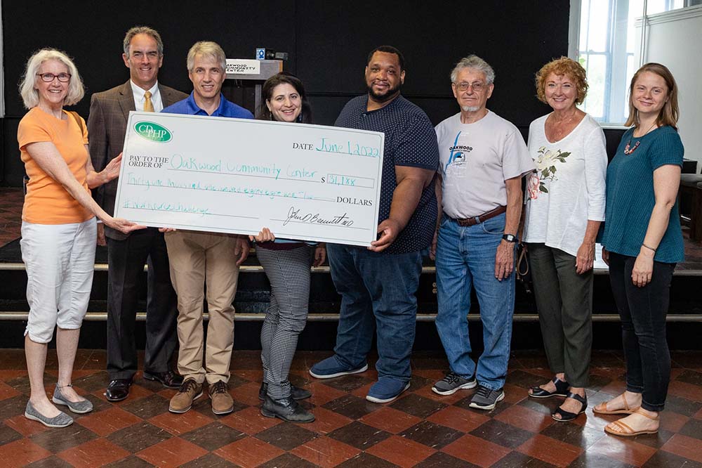 Oakwood Community Center accepts $31,000 raised during CDPHP Workforce Team Challenge 2022
