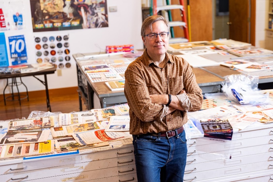 CDPHP member and heart attack survivor, Michael Oatman, stands in his classroom at Rensselaer Polytechnic Institute, where he is a professor. 