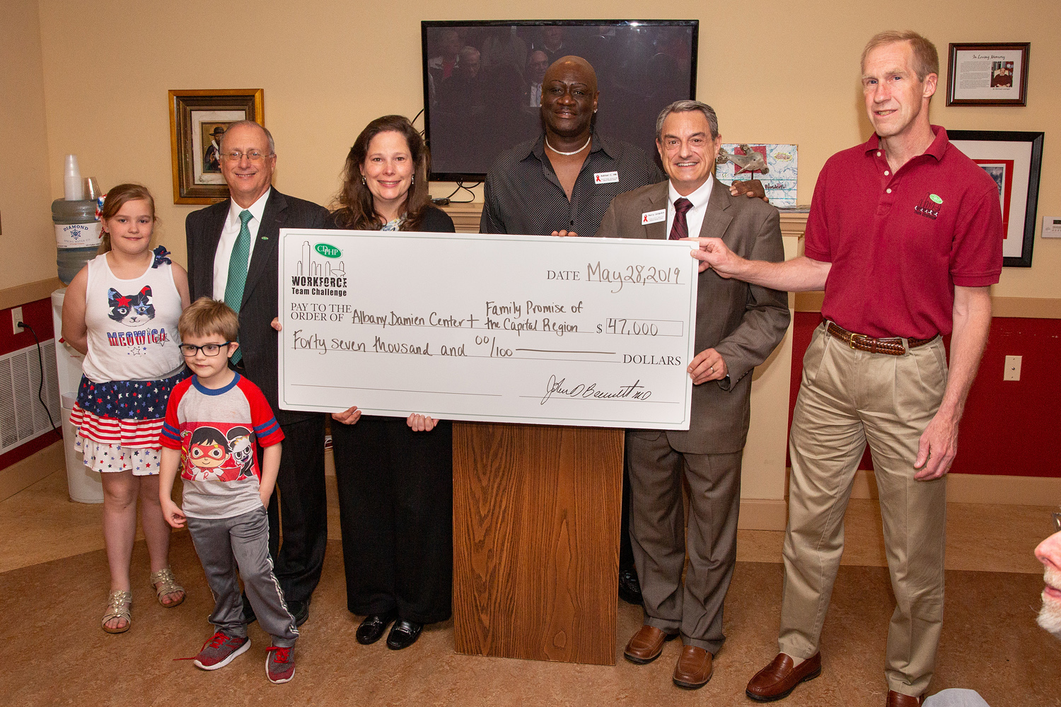 CDPHP donation check to Albany Damien and Family promise picture