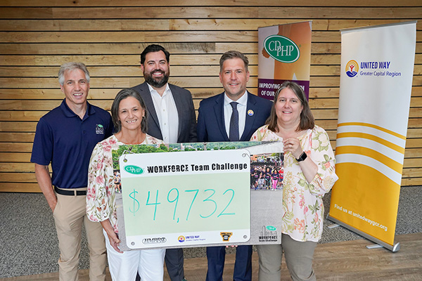 Organizers of the 2026 CDPHP Workforce Team Challenge present proceeds to local not-for-profits.